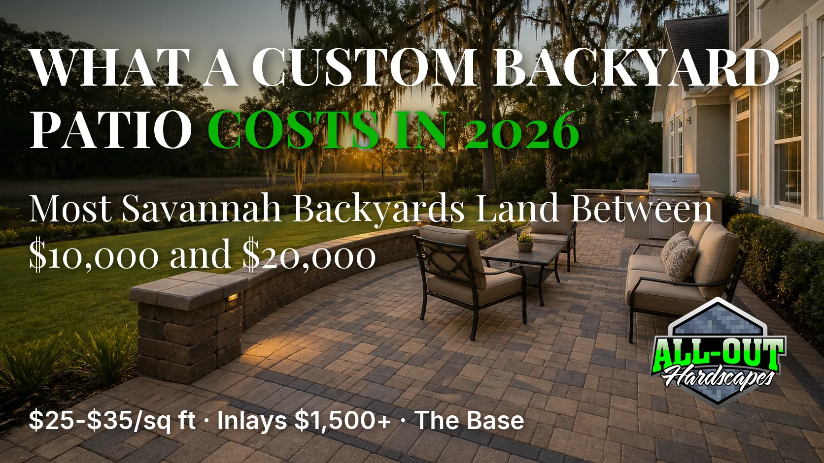 A finished custom paver patio with a seat wall behind a Savannah, Georgia home