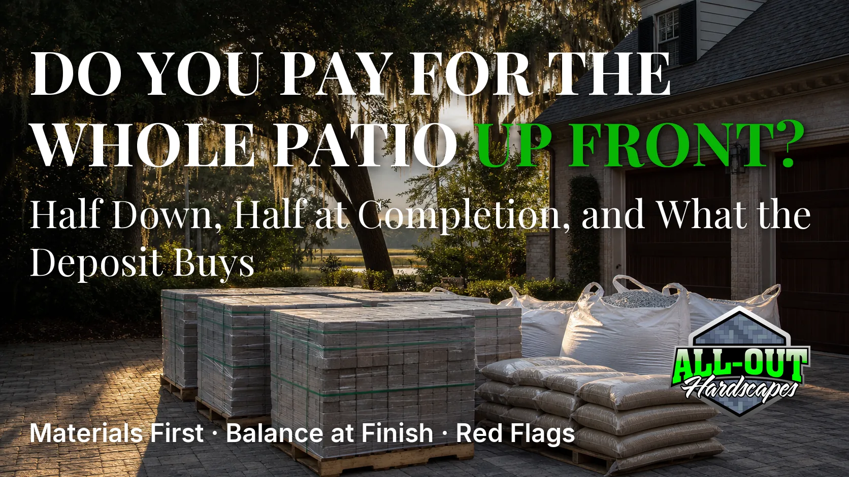 Pallets of pavers and bulk bags of base stone delivered to a Savannah driveway