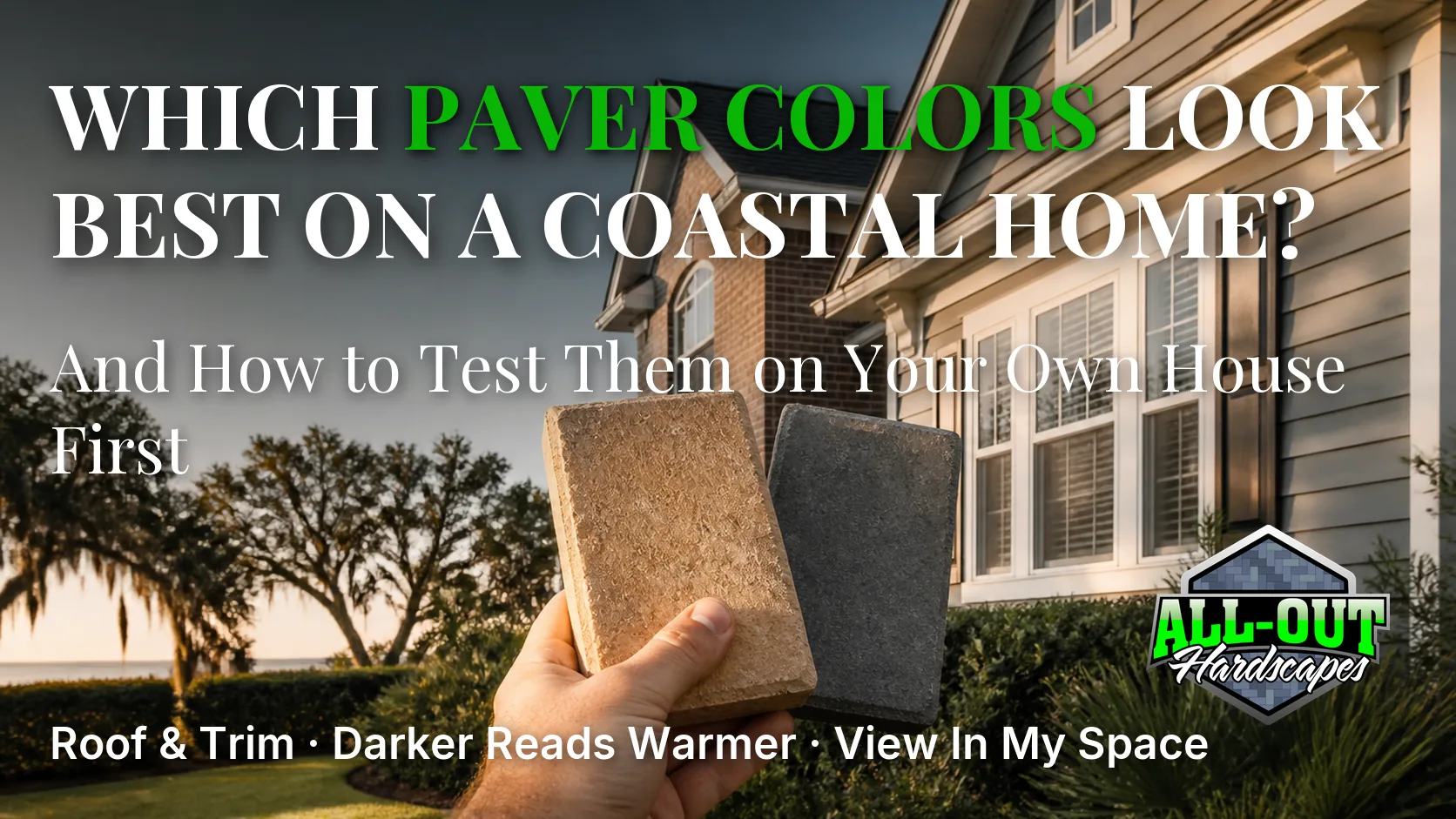 Comparing warm tan and charcoal paver samples against a coastal Georgia home