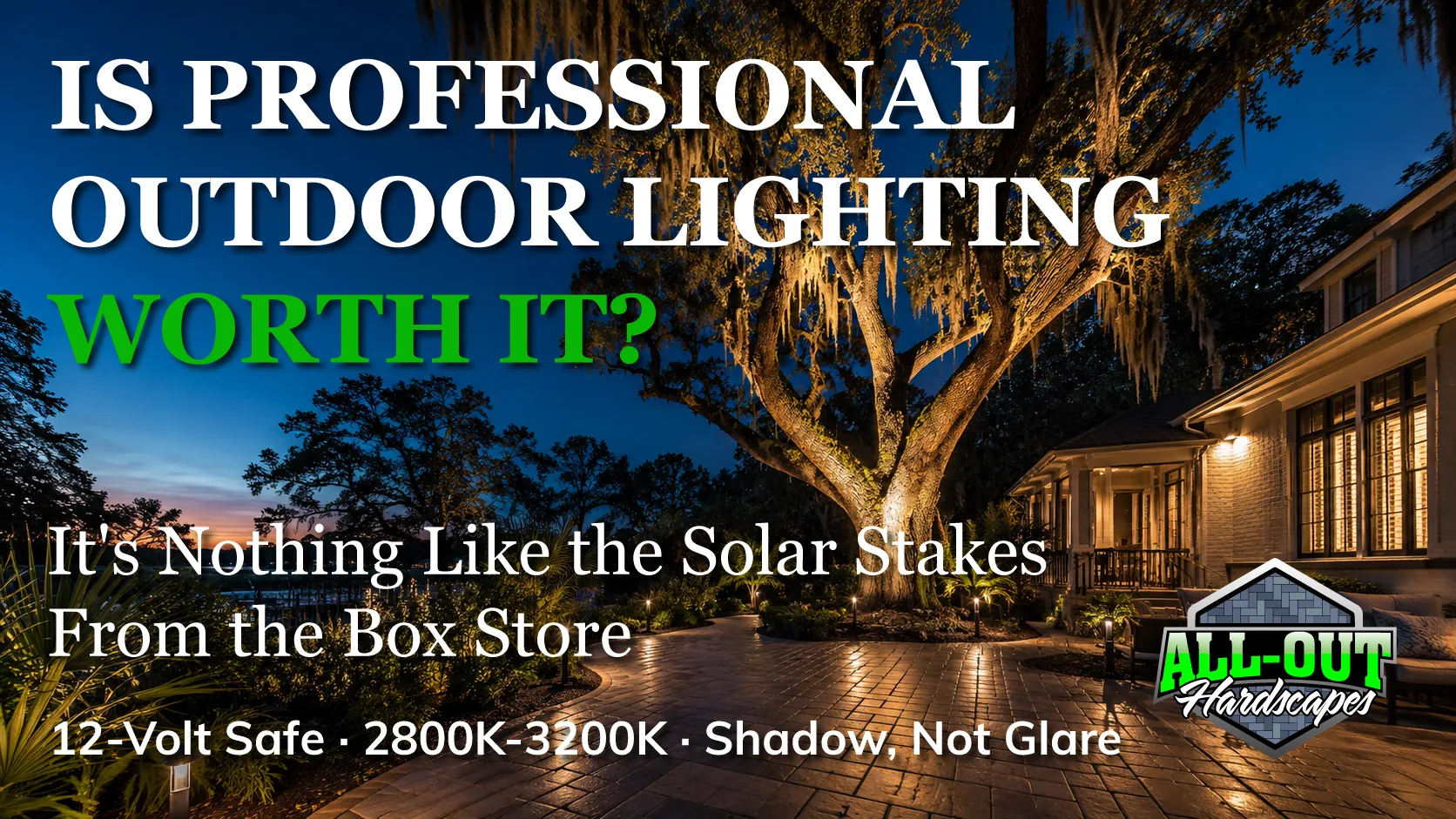 Professional low-voltage landscape lighting on a paver patio at blue hour in Savannah, Georgia