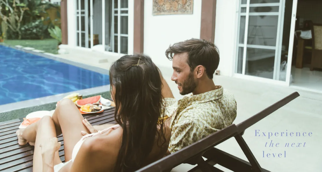 Couple enjoying their fiberglass pool
