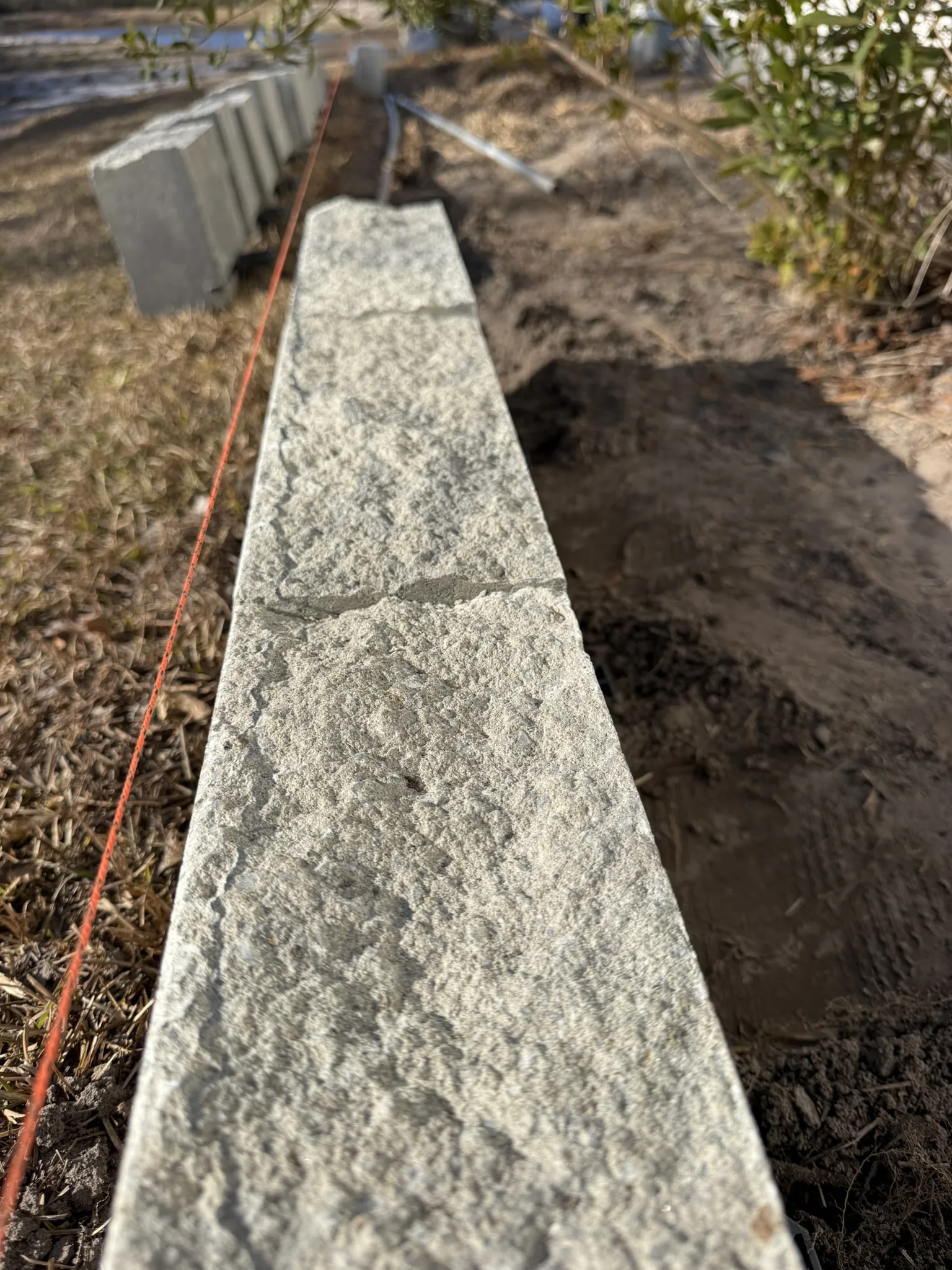 CarMicheals Residence -- Block-Bordered Landscape Beds with Paver Fire Pit photo