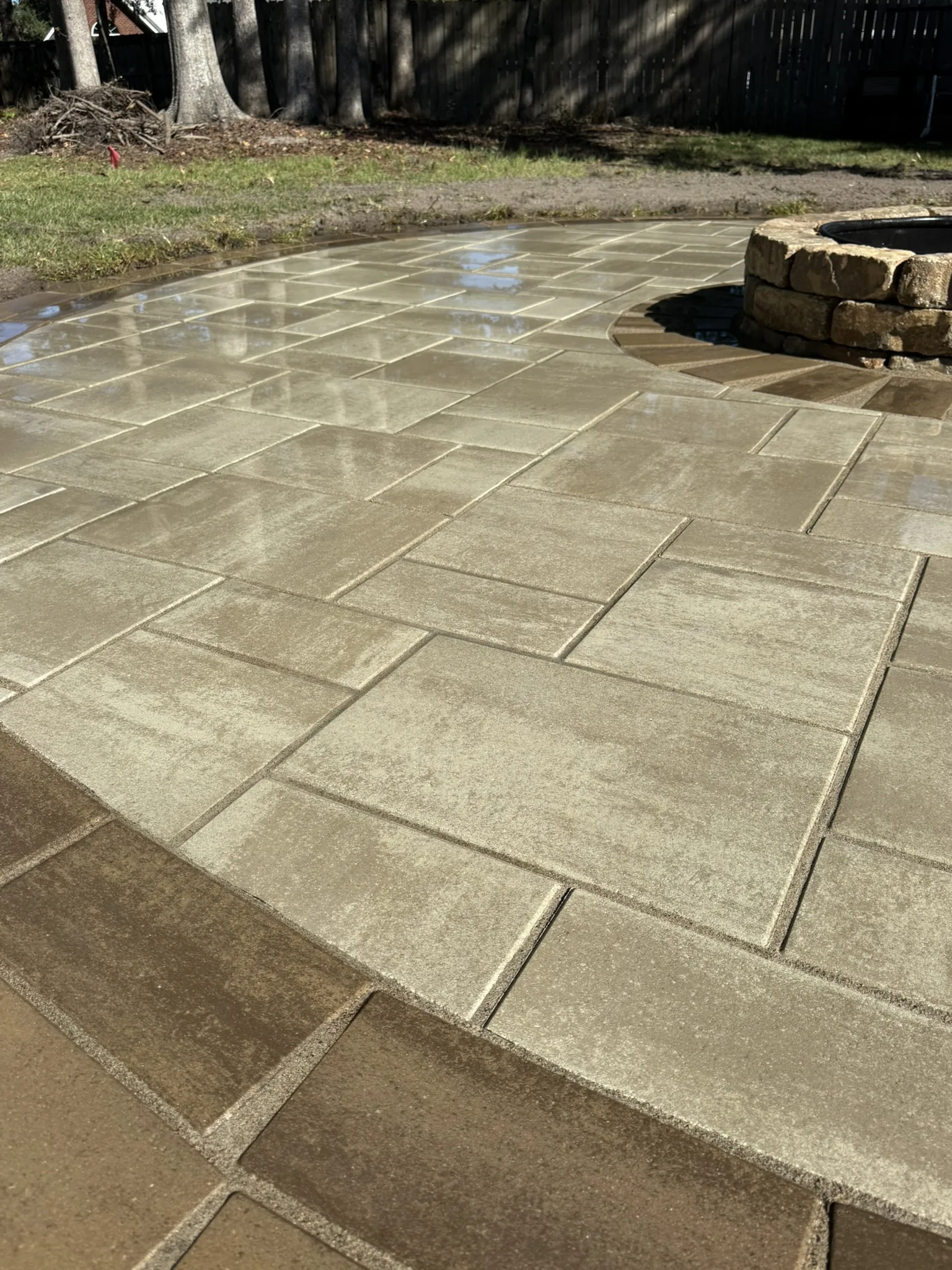 LeBlanc Residence -- Round Paver Patio with Built-In Fire Pit photo
