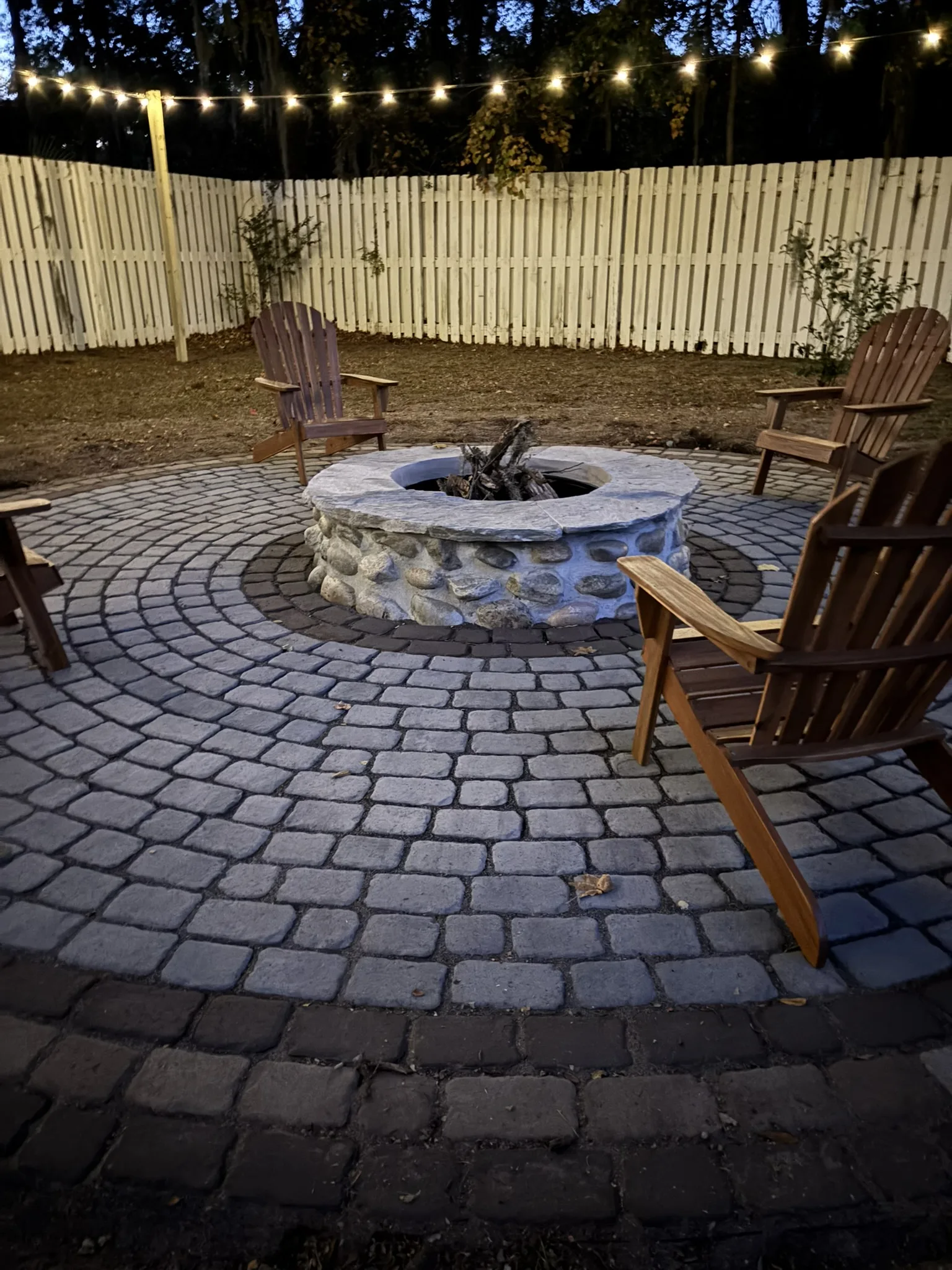 Plummer Residence -- Circular Cobble Paver Fire Pit Patio photo