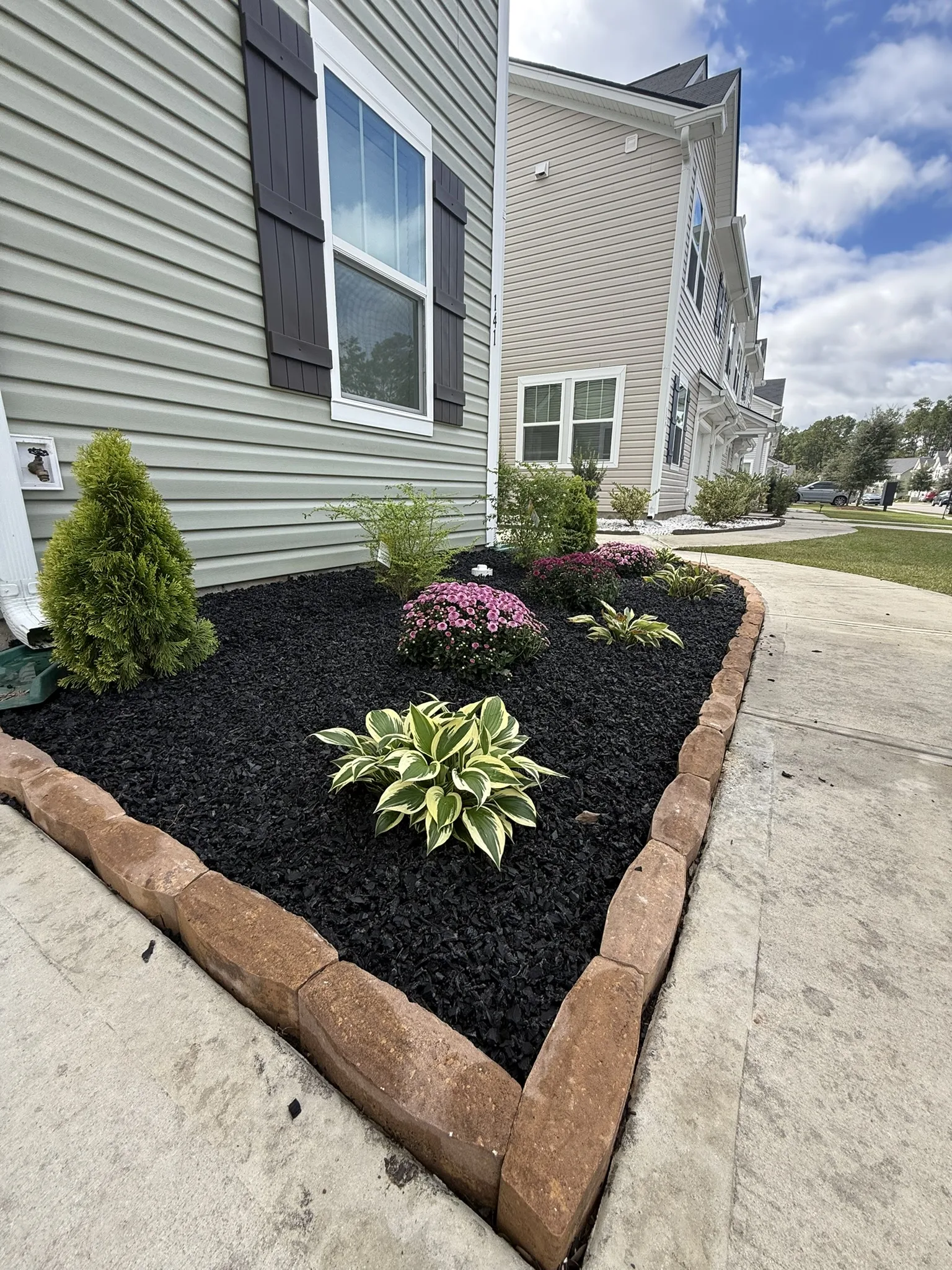 Clark Residence -- Townhome Landscape Beds with Paver Edging photo