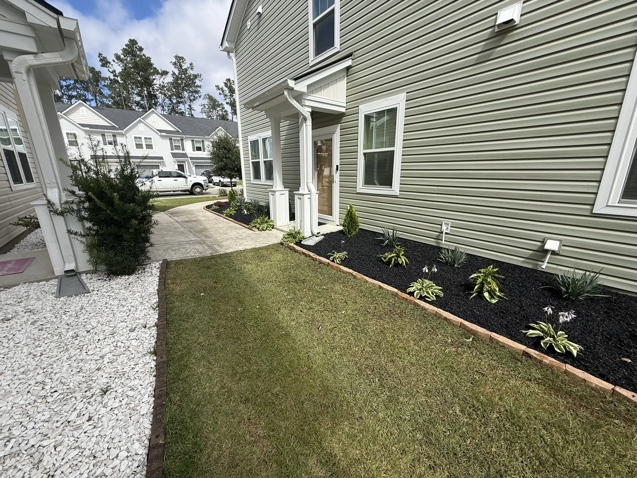 Clark Residence -- Townhome Landscape Beds with Paver Edging photo