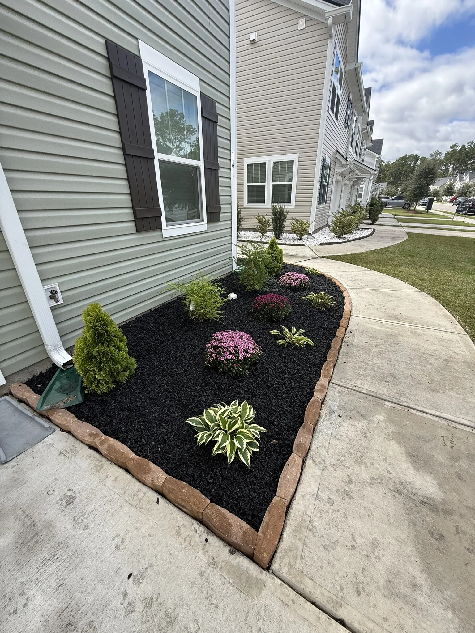 Clark Residence -- Townhome Landscape Beds with Paver Edging photo