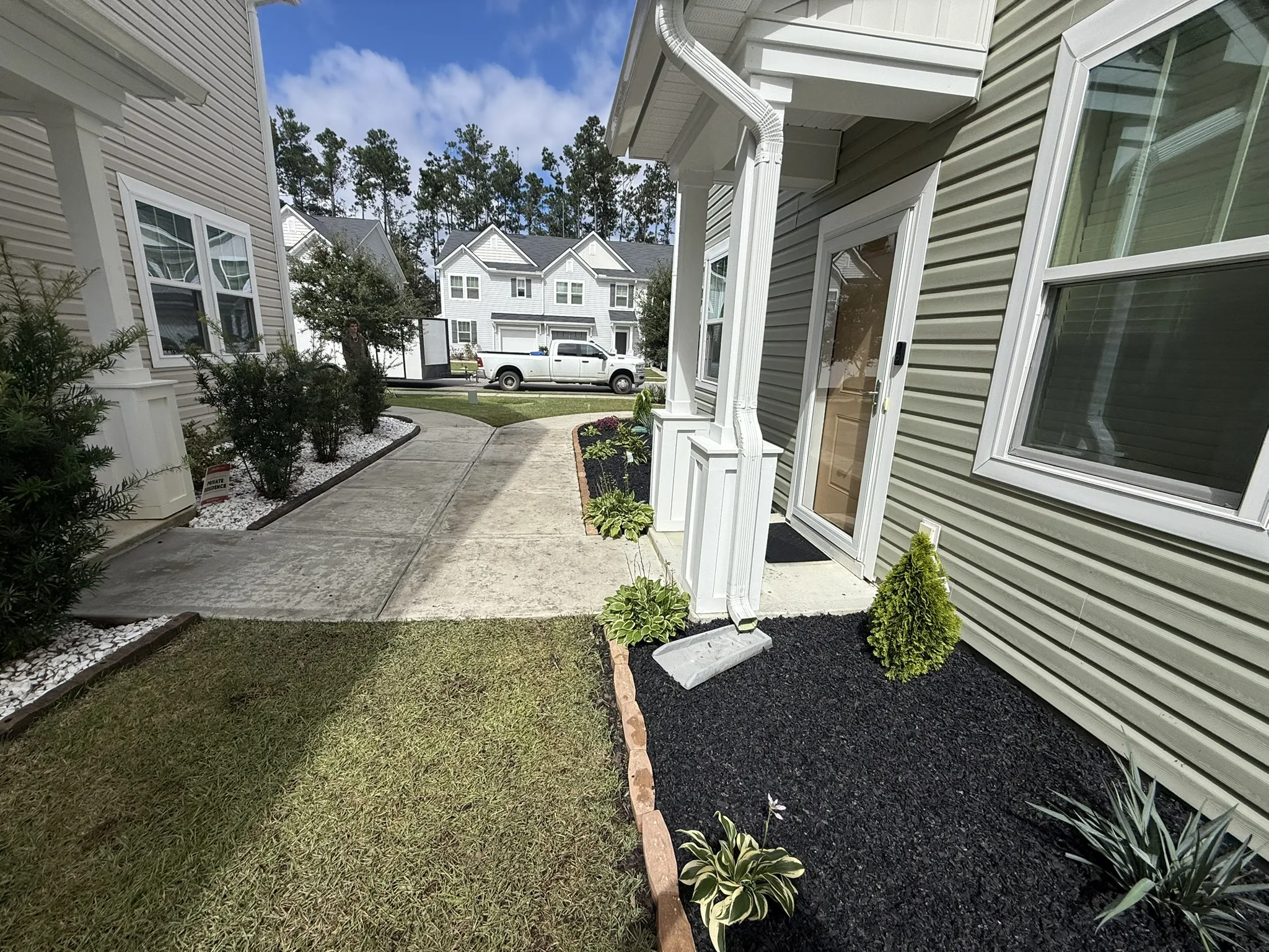 Clark Residence -- Townhome Landscape Beds with Paver Edging photo