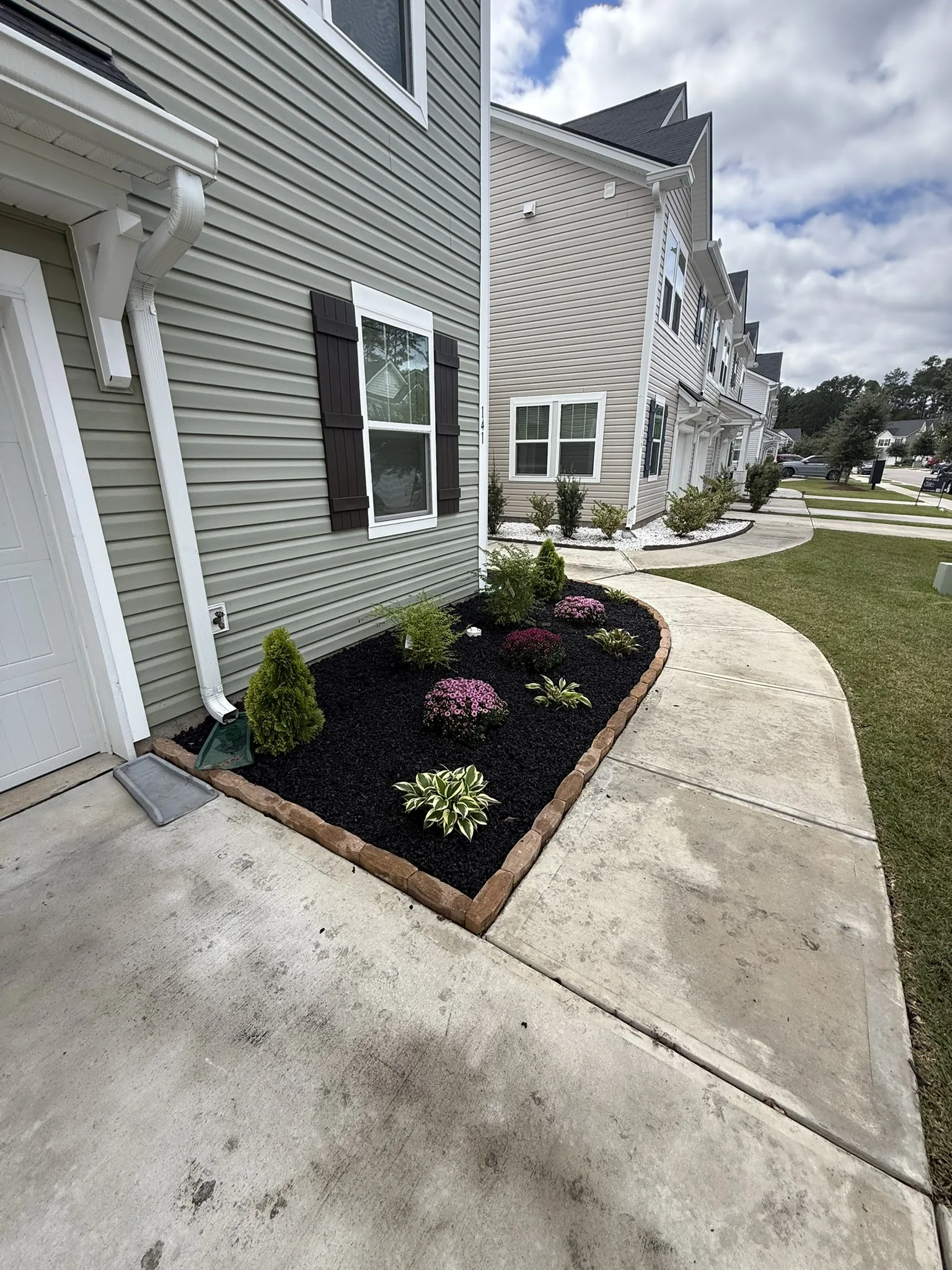 Clark Residence -- Townhome Landscape Beds with Paver Edging photo