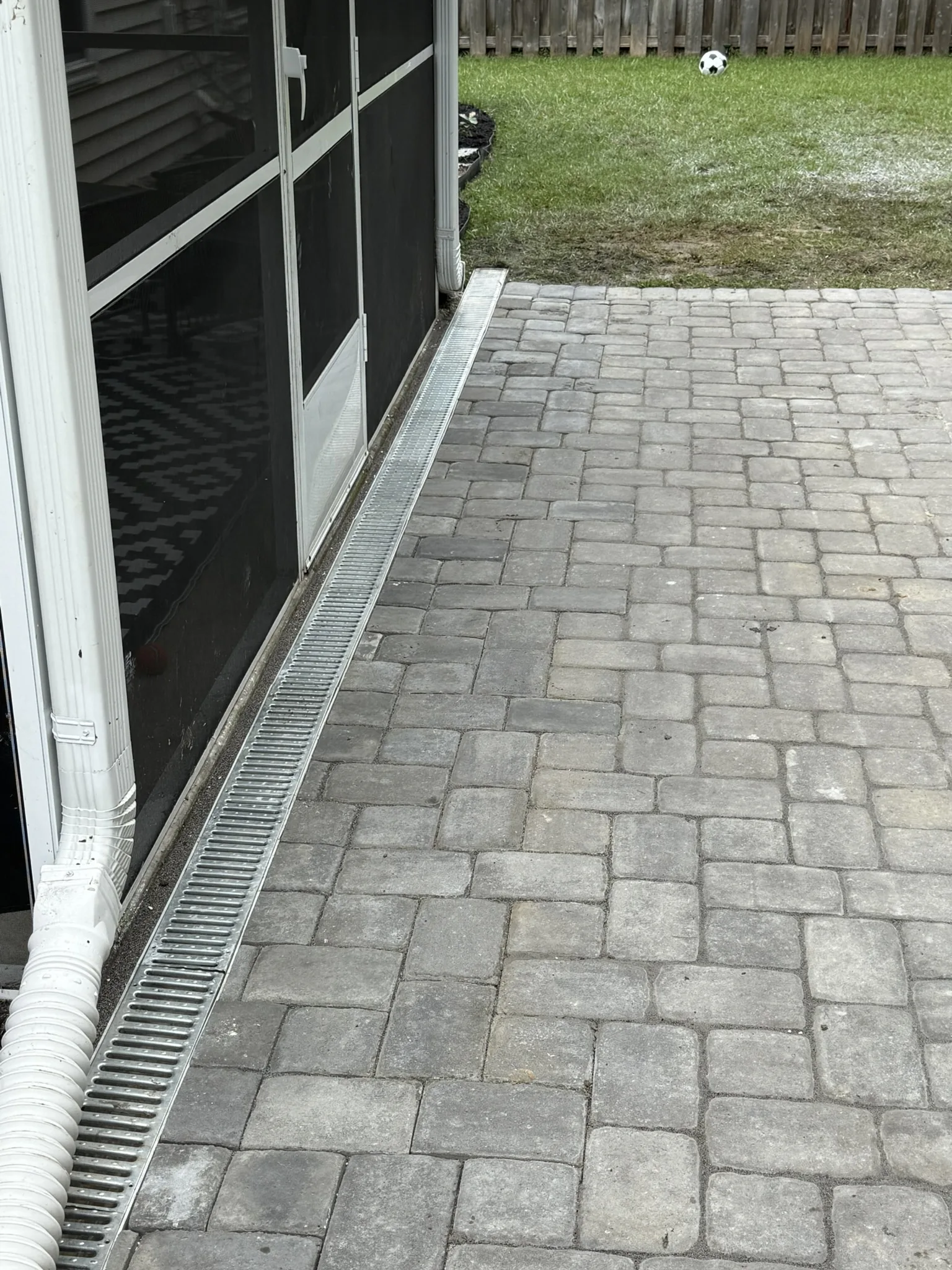 Gigi and Chris -- Paver Patio with Seat Wall and Channel Drain