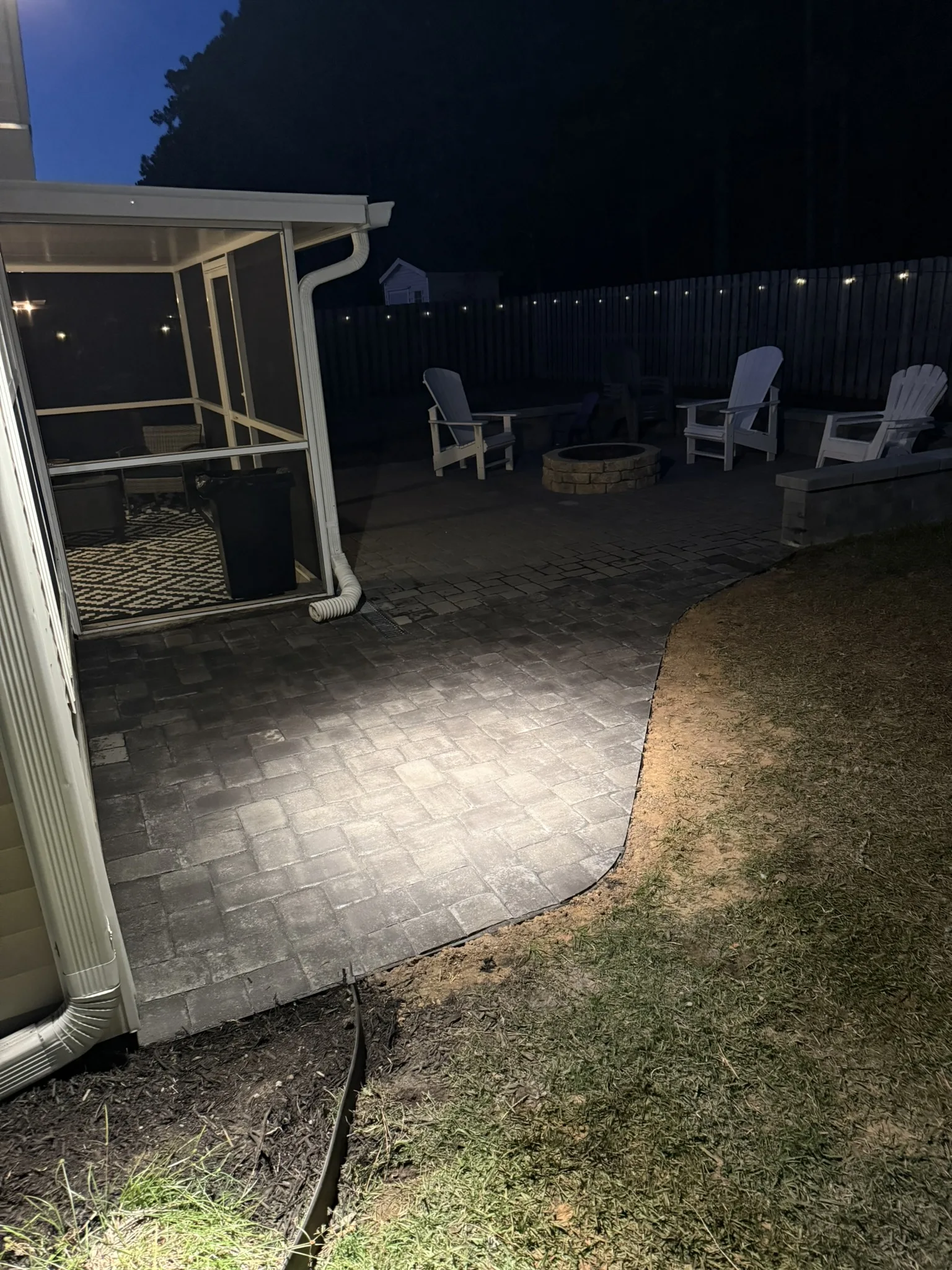 Gigi and Chris -- Paver Patio with Seat Wall and Channel Drain photo
