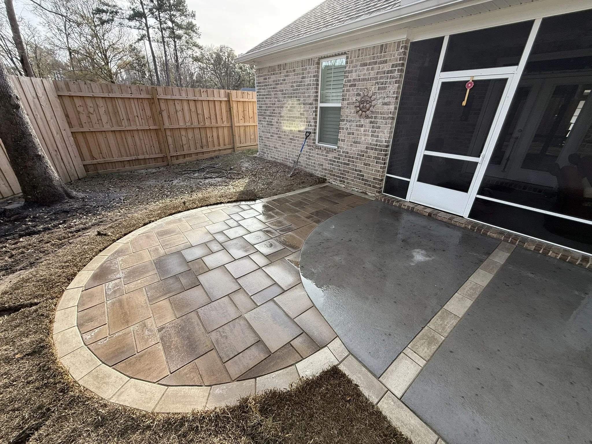 Leonard Residence -- Patio Extension with Circular Paver Wings photo