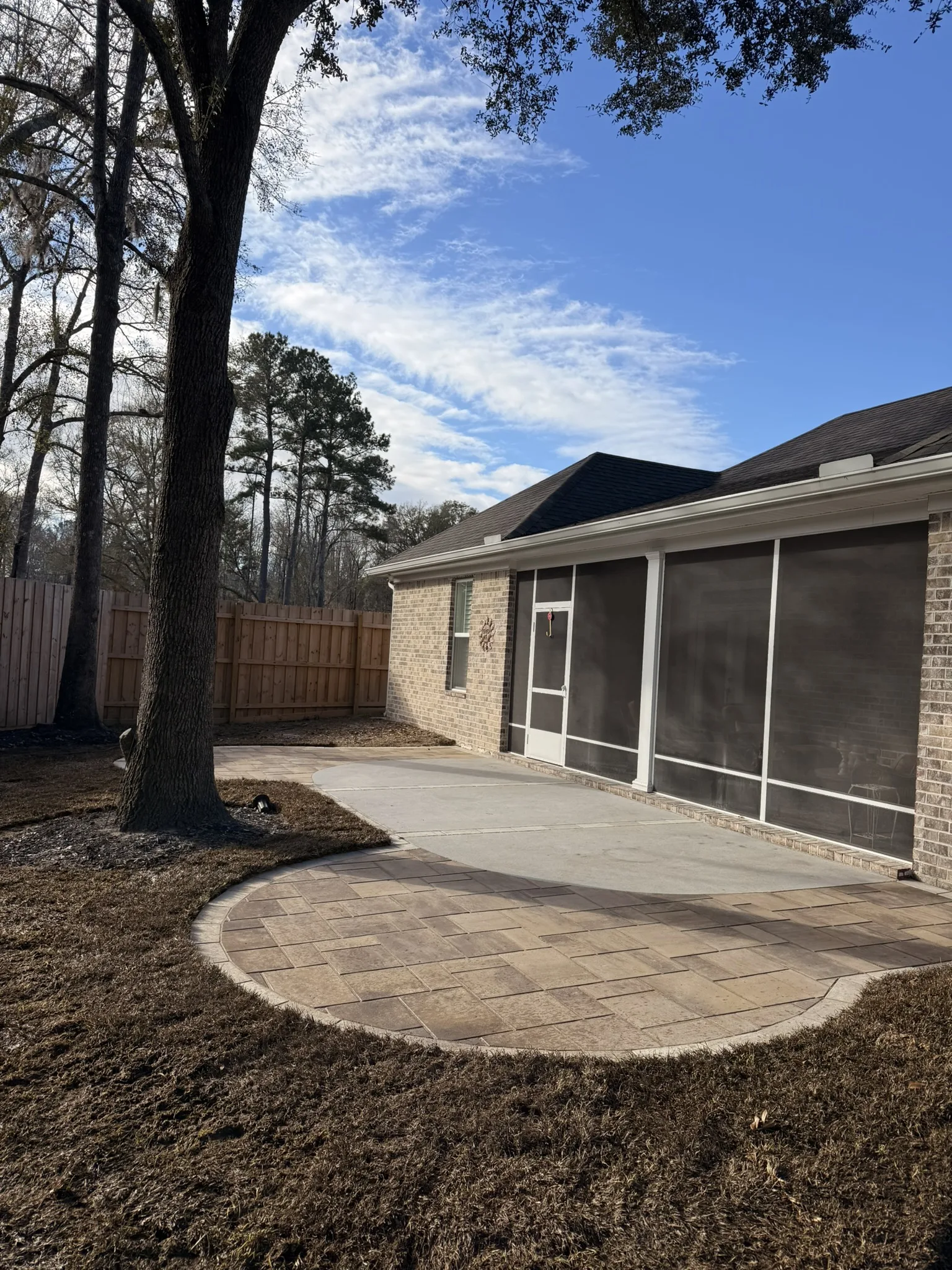 Leonard Residence -- Patio Extension with Circular Paver Wings photo