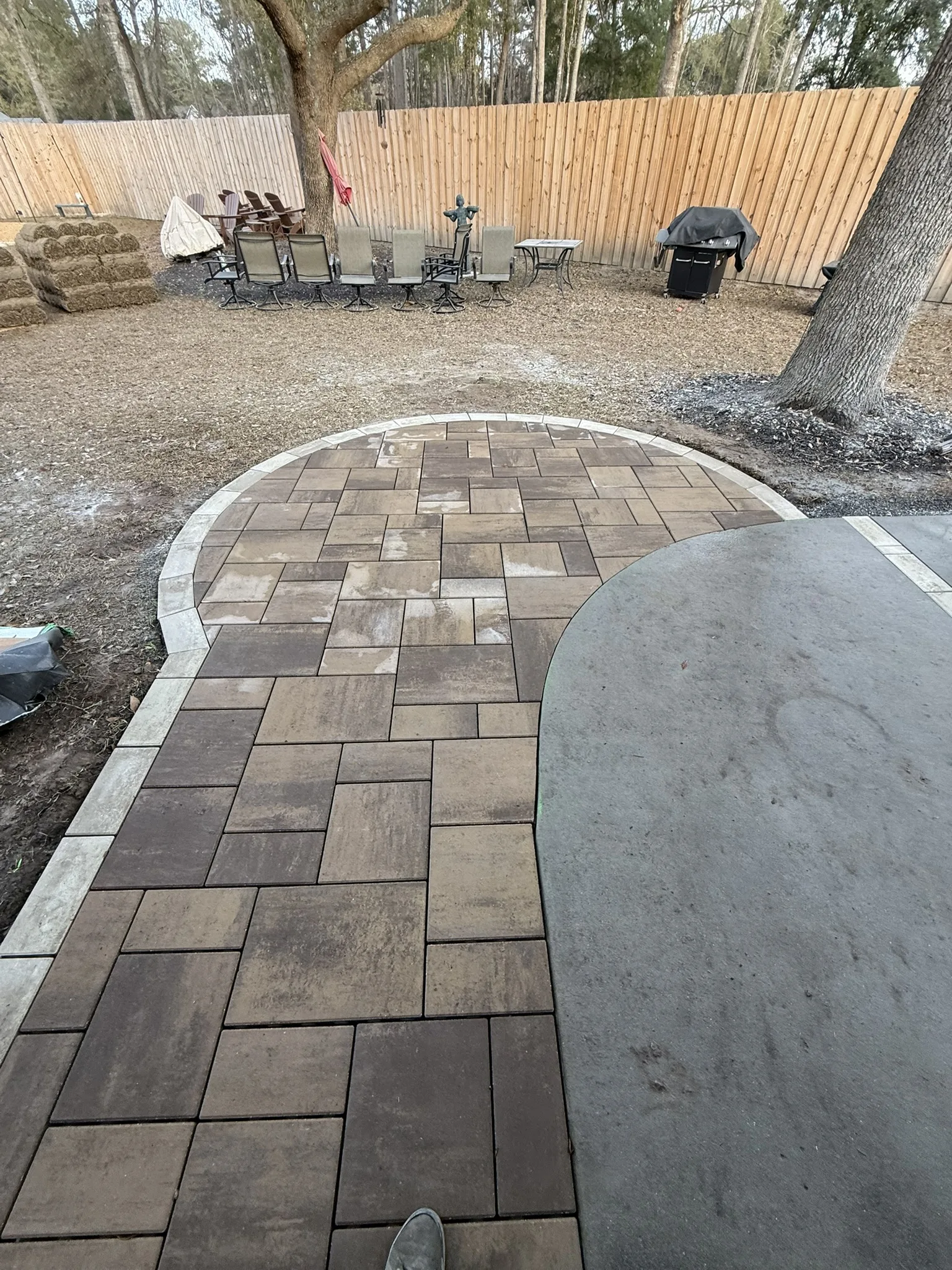 Leonard Residence -- Patio Extension with Circular Paver Wings photo