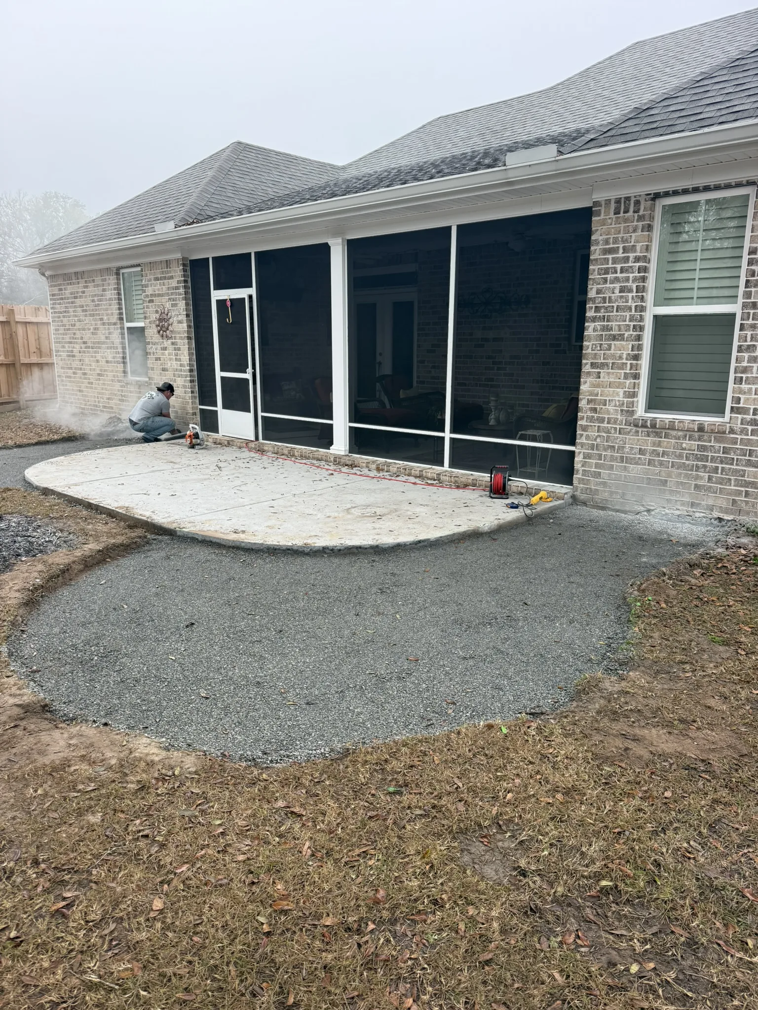 Leonard Residence -- Patio Extension with Circular Paver Wings photo