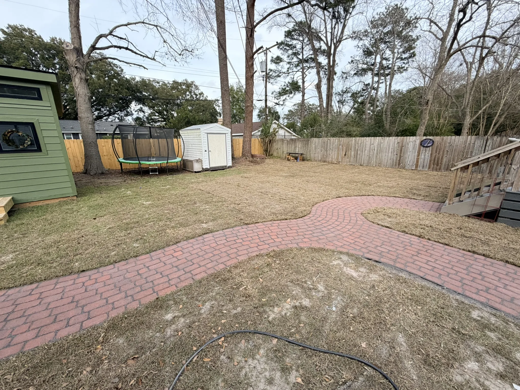 Pope Residence -- Checkerboard Patio with Brick Paver Walkway photo