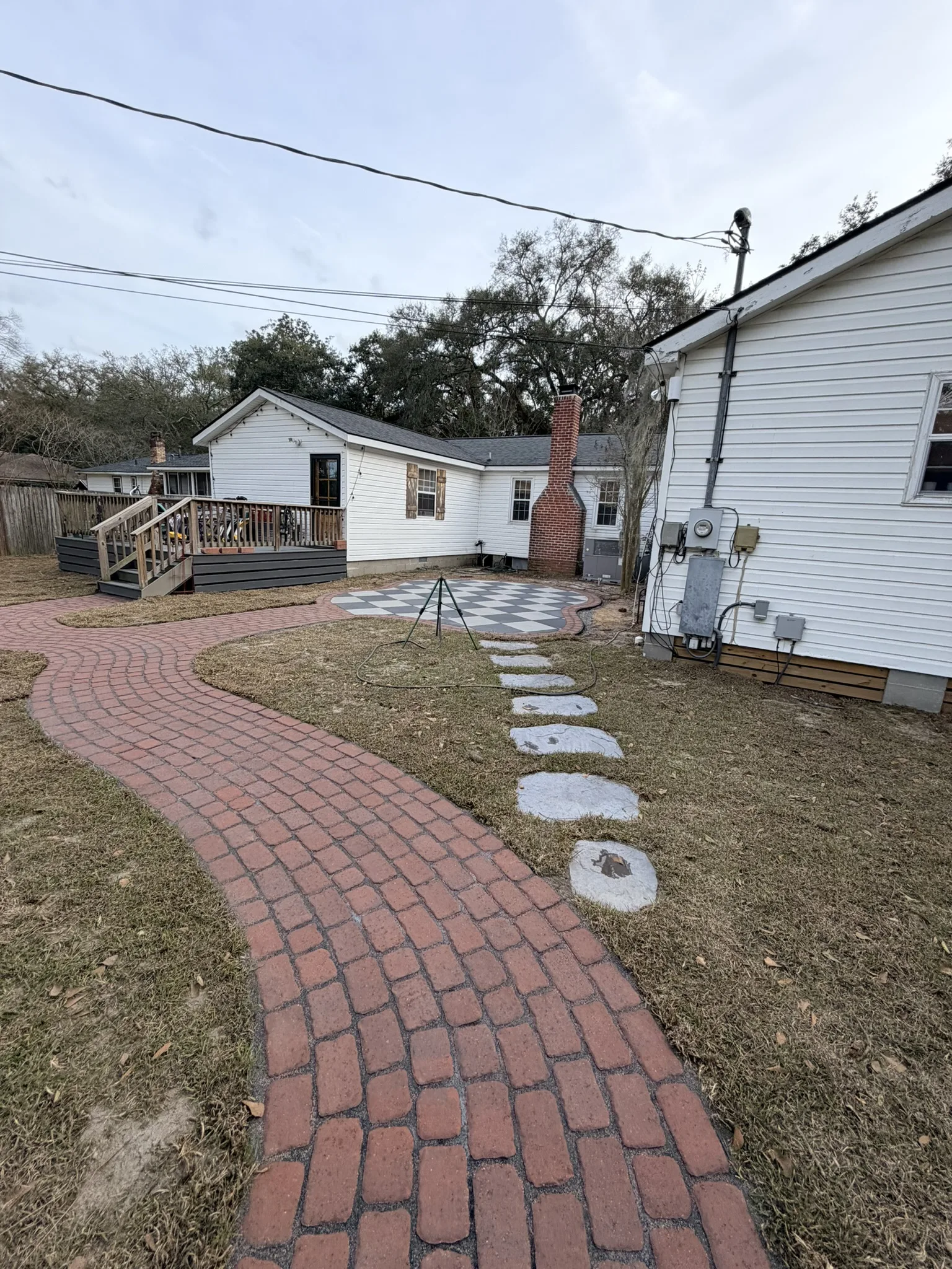 Pope Residence -- Checkerboard Patio with Brick Paver Walkway photo
