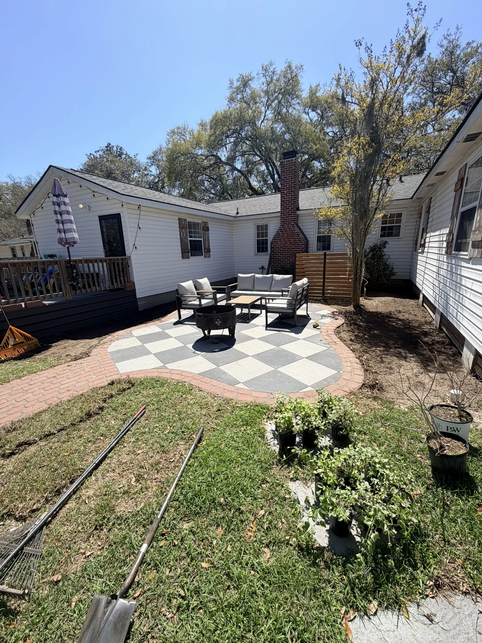 Pope Residence -- Checkerboard Patio with Brick Paver Walkway photo