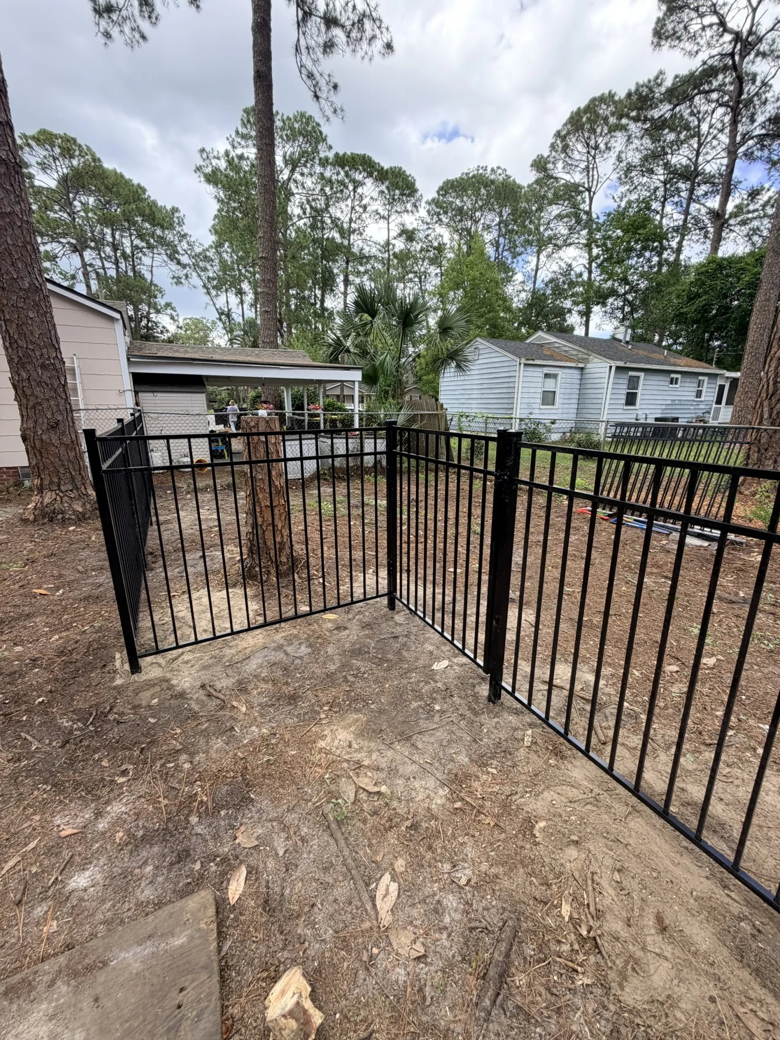 Kameyer Residence -- Backyard Clearing with Aluminum Fence Enclosure photo