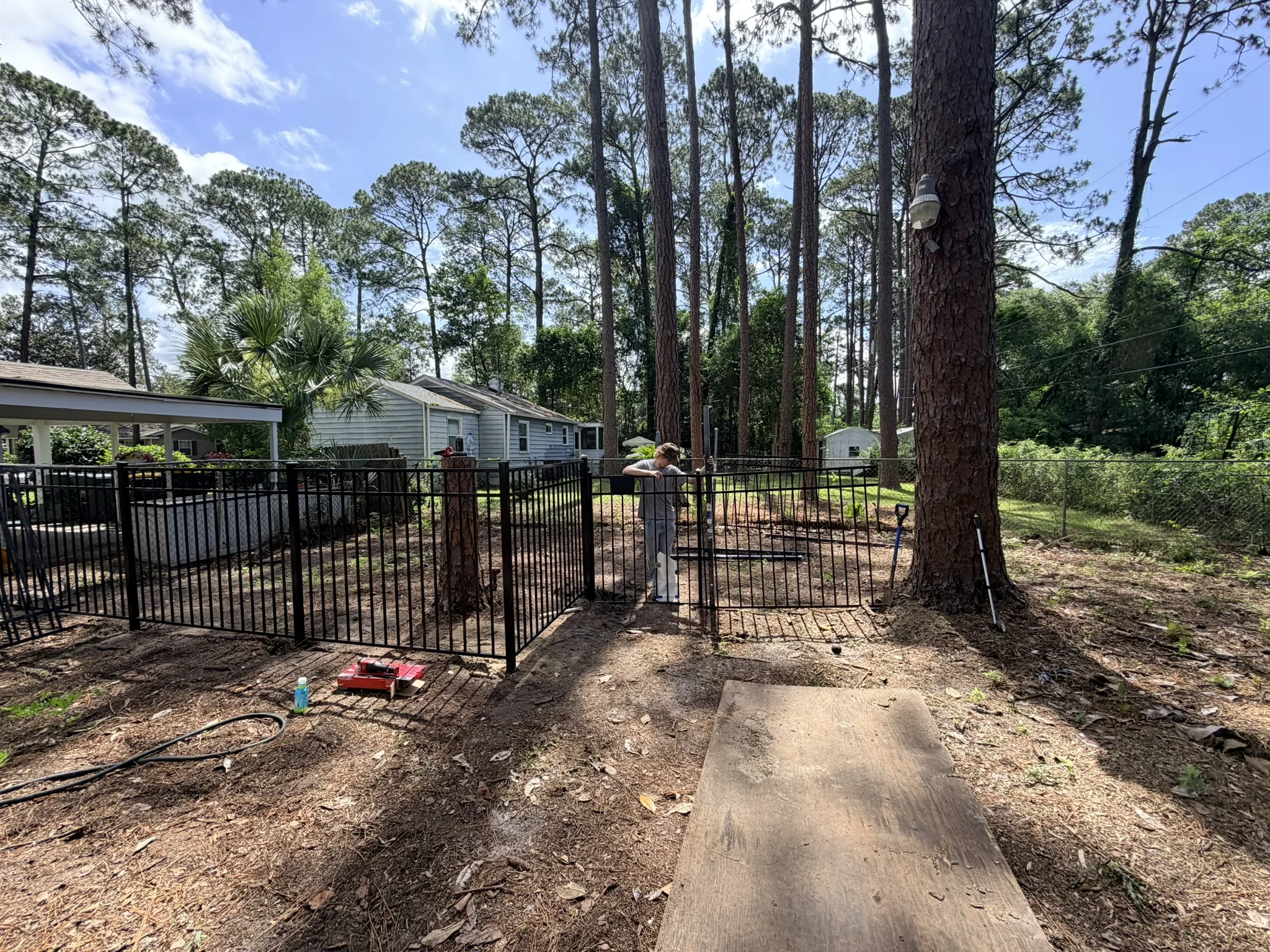 Kameyer Residence -- Backyard Clearing with Aluminum Fence Enclosure photo