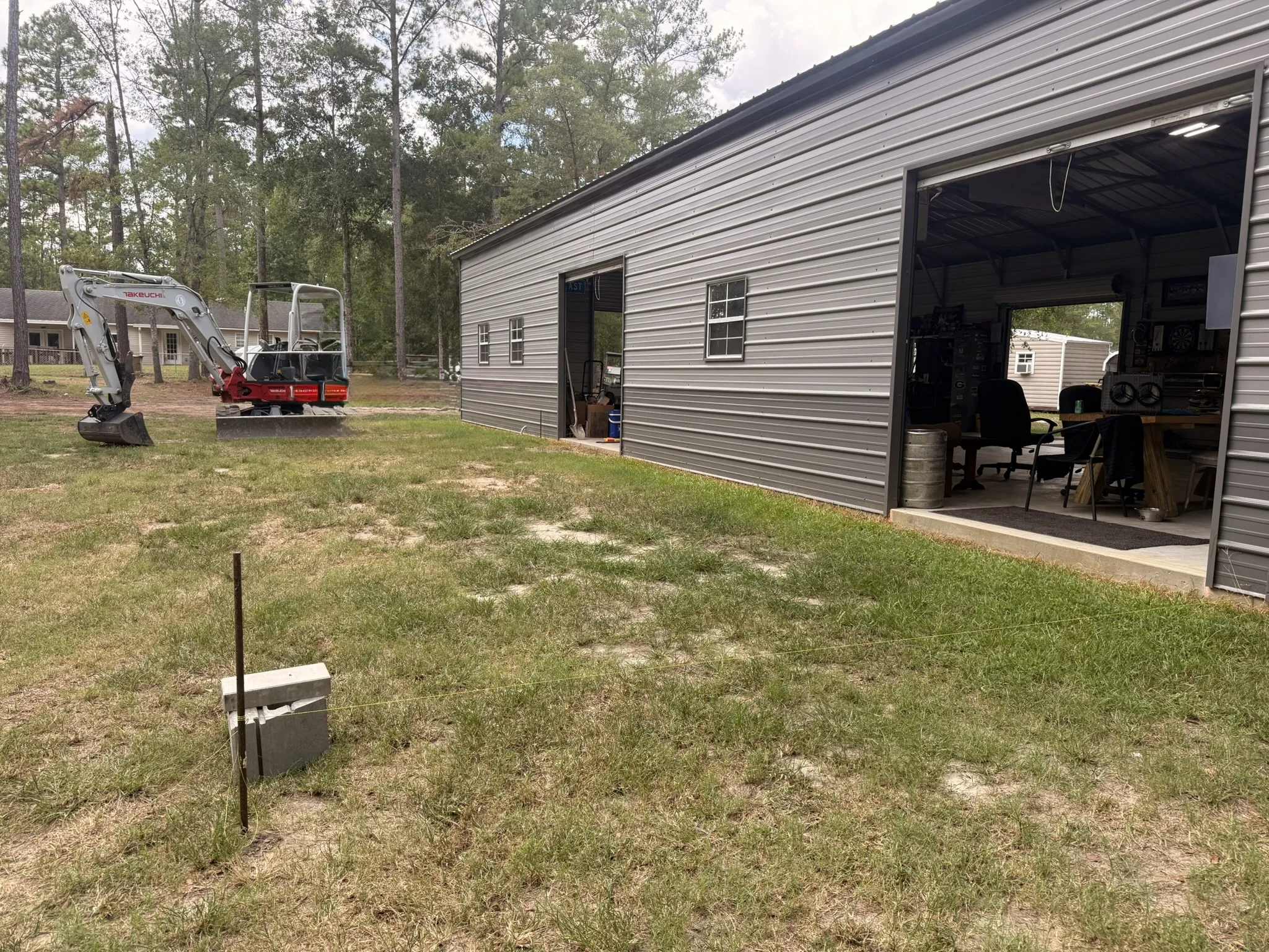 P. Collins Residence -- Site Grading Around Metal Shop Building photo