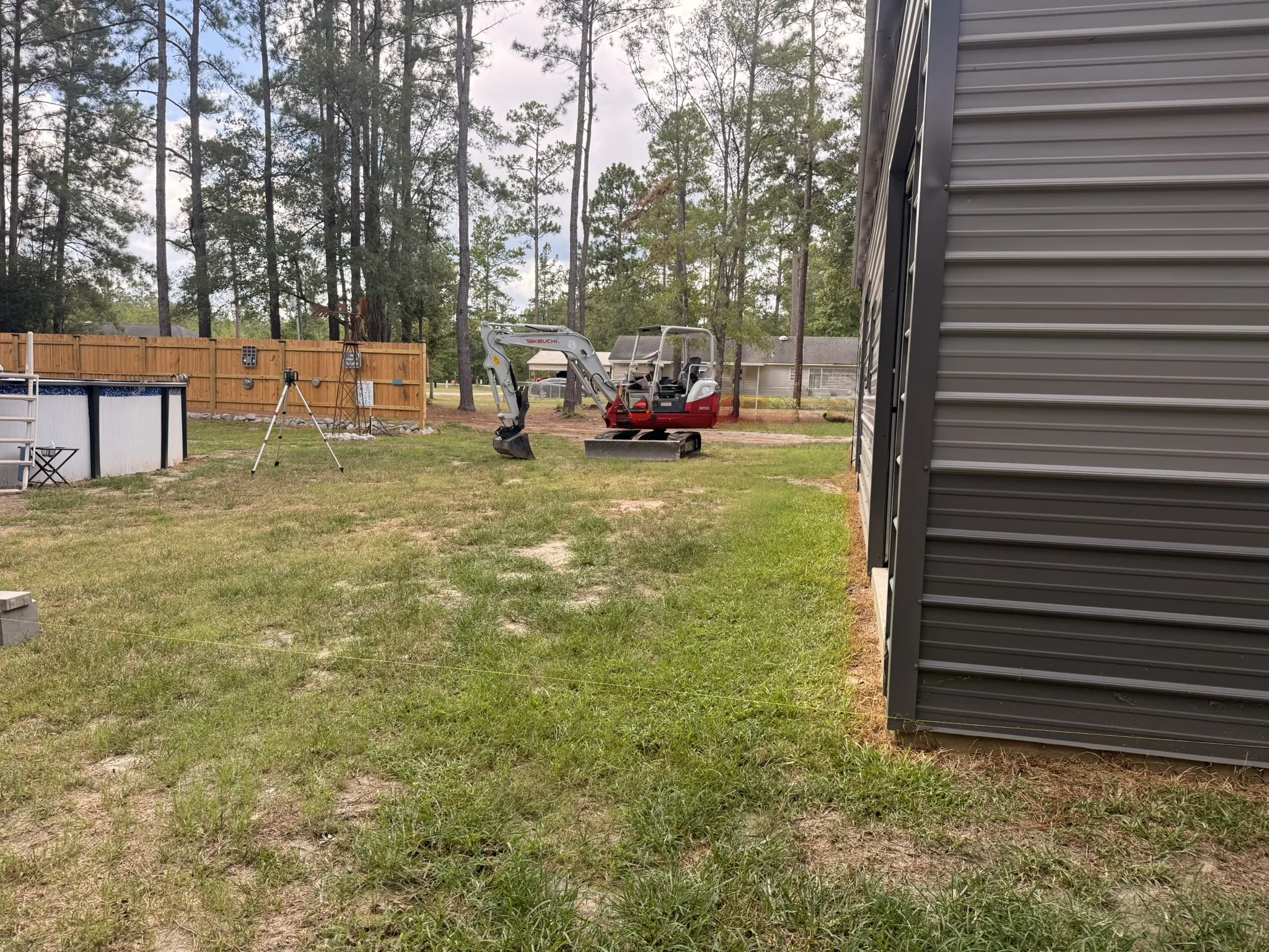 P. Collins Residence -- Site Grading Around Metal Shop Building photo
