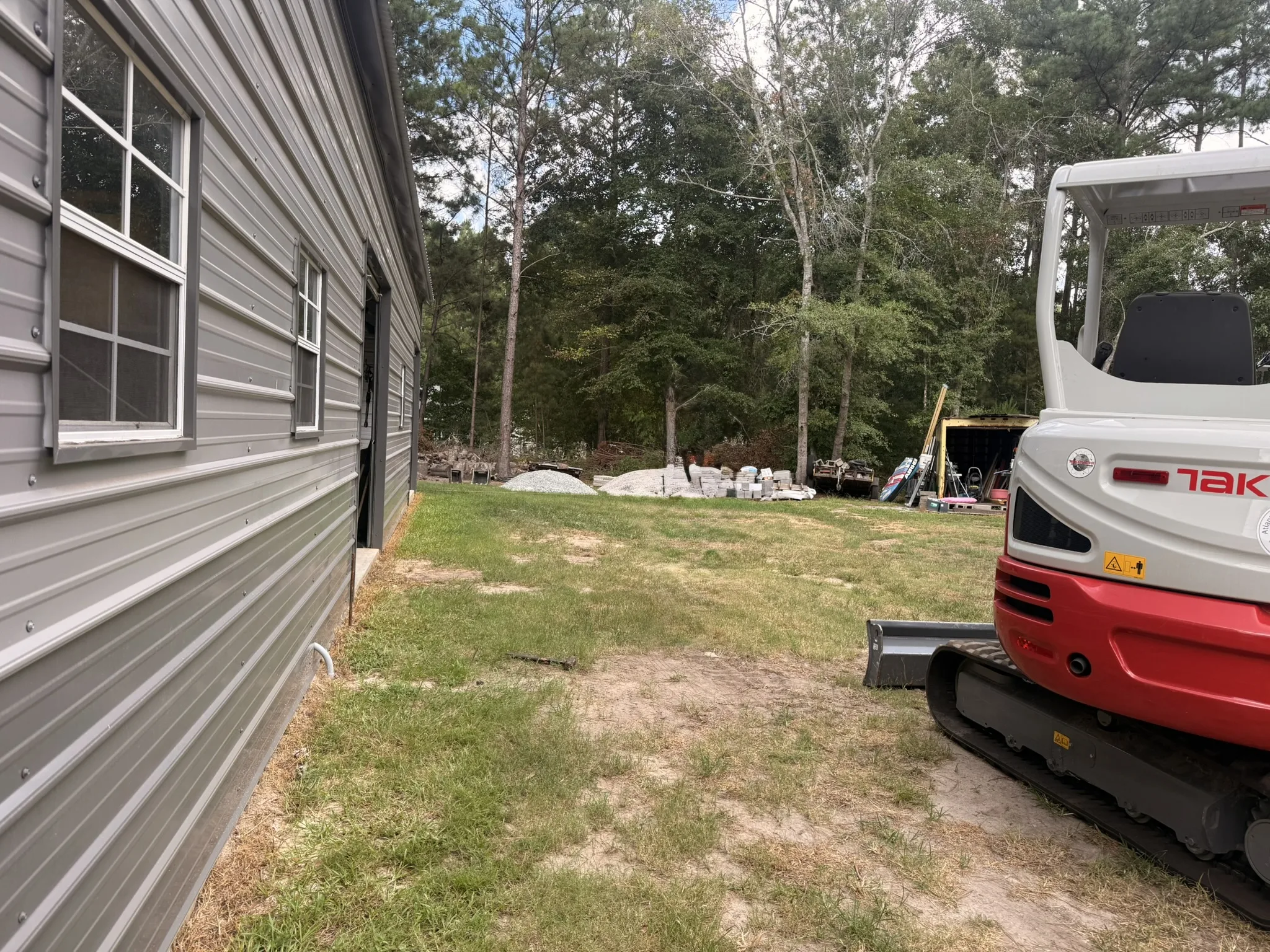 P. Collins Residence -- Site Grading Around Metal Shop Building photo