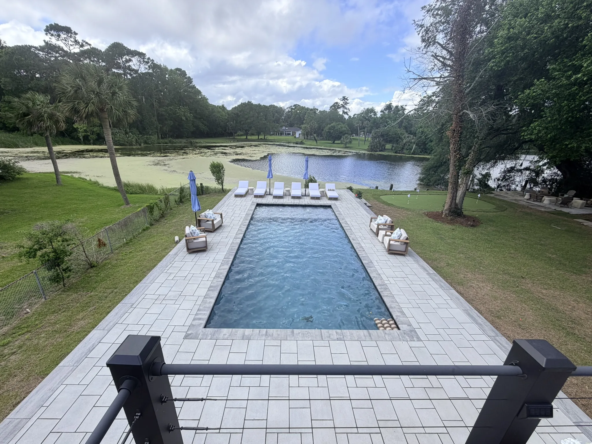 Baker Residence -- Pool Deck, Raised Wall, and Putting Green photo