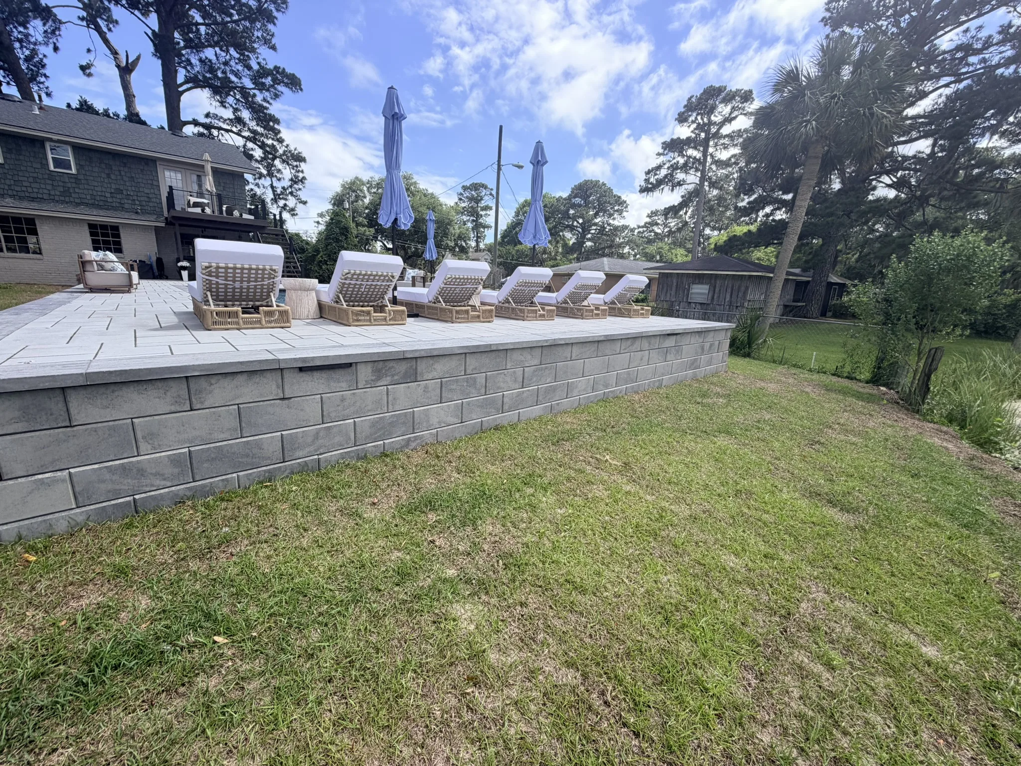 Baker Residence -- Pool Deck, Raised Wall, and Putting Green photo