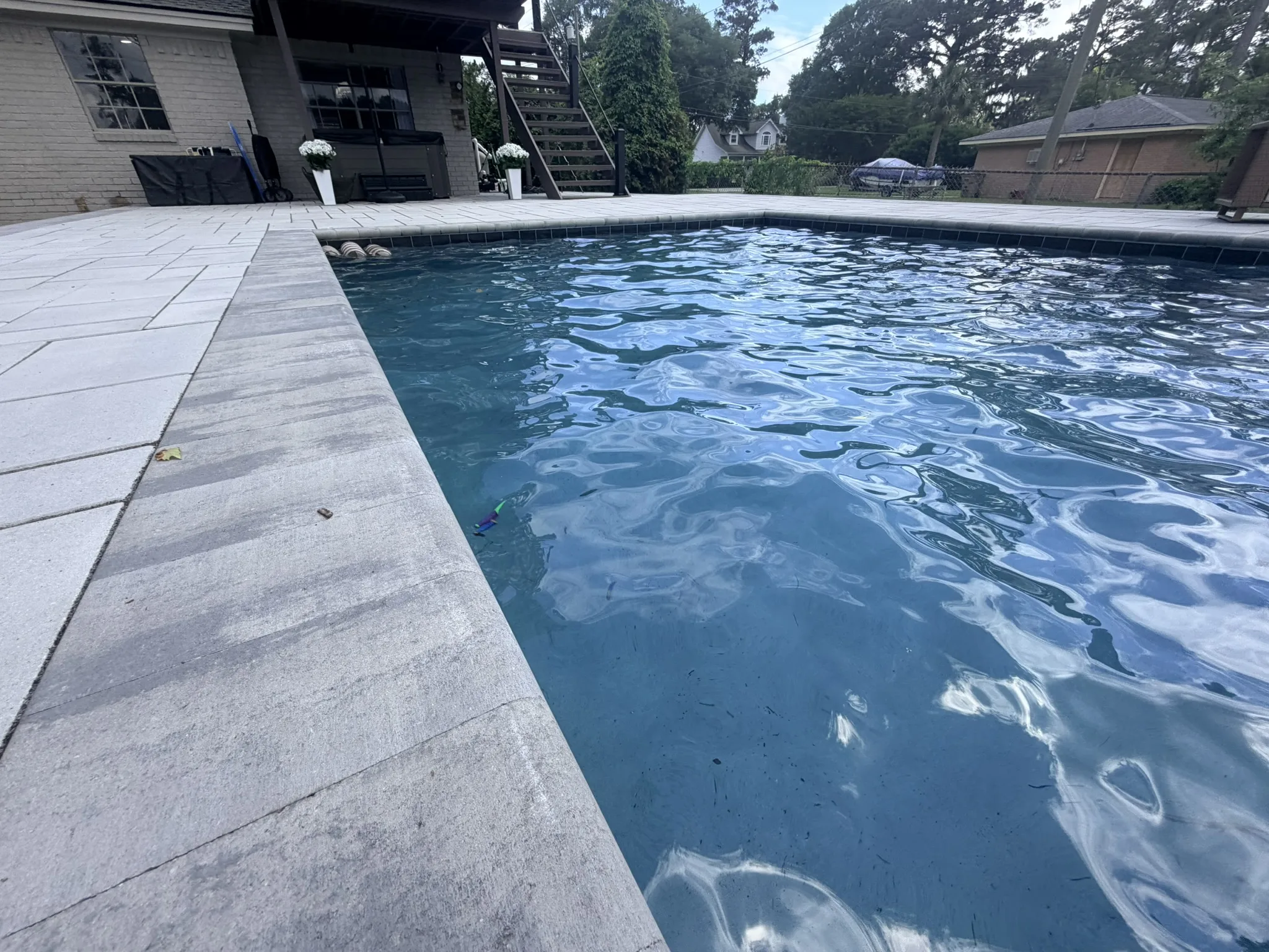 Baker Residence -- Pool Deck, Raised Wall, and Putting Green photo