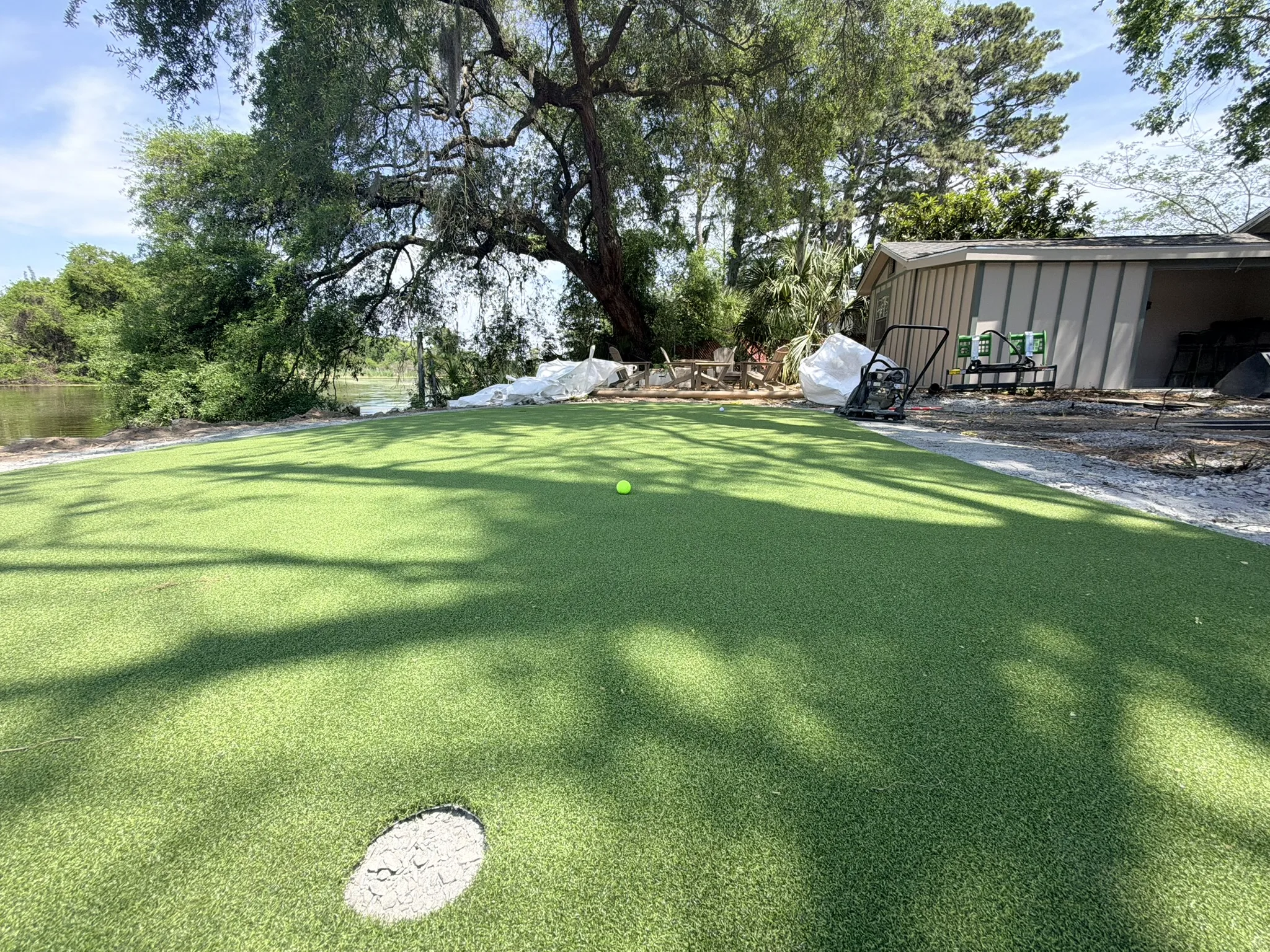 Baker Residence -- Pool Deck, Raised Wall, and Putting Green photo