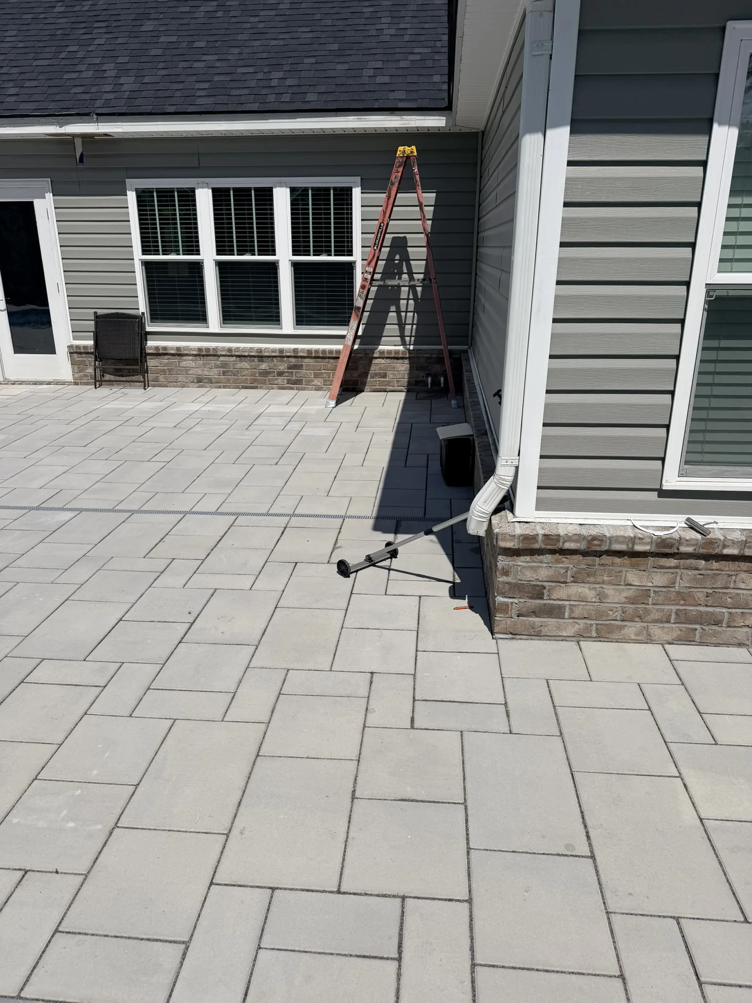 Hammer Residence -- Pool Deck Paver Replacement with Trench Drain photo