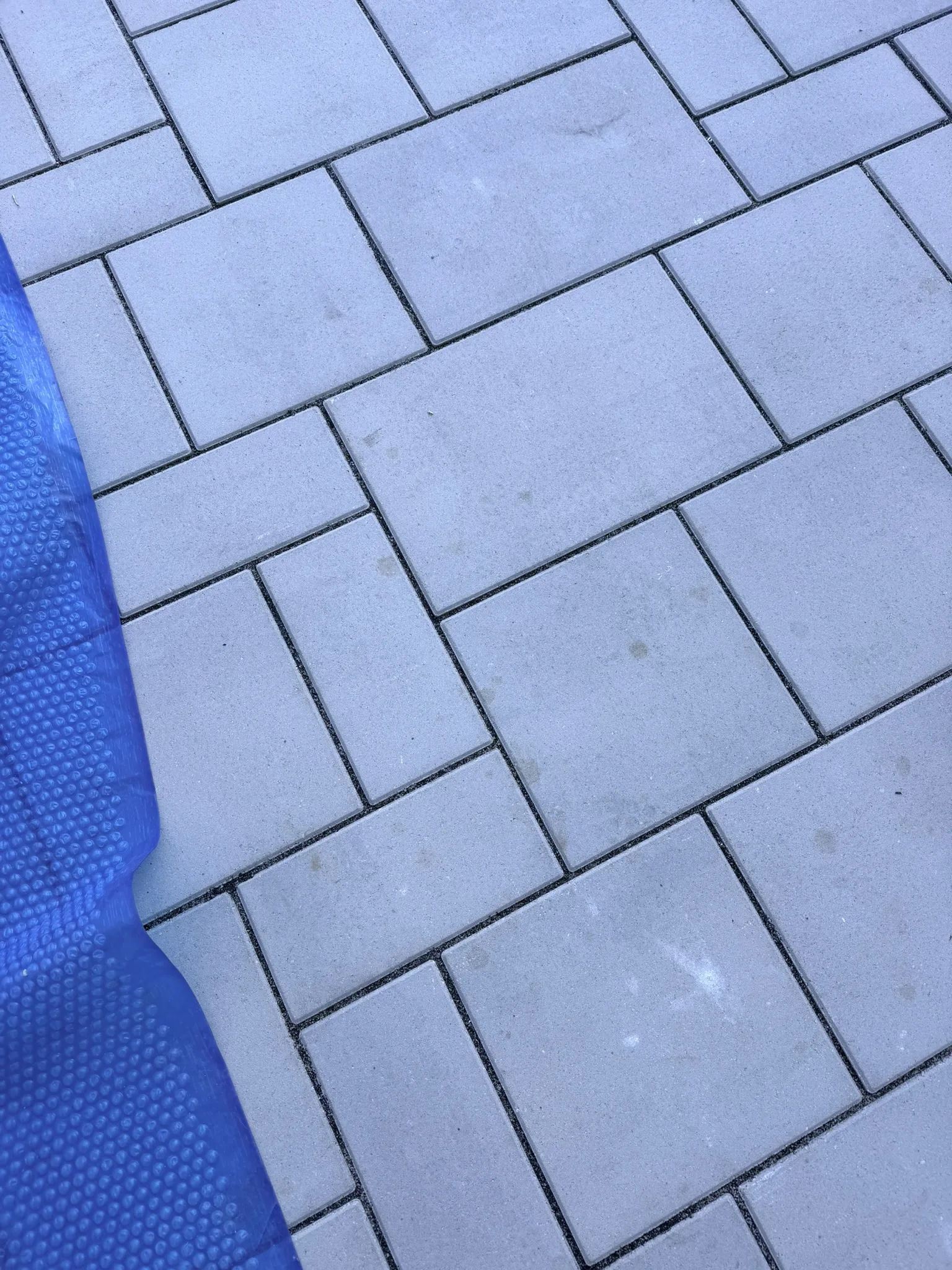 Hammer Residence -- Pool Deck Paver Replacement with Trench Drain photo