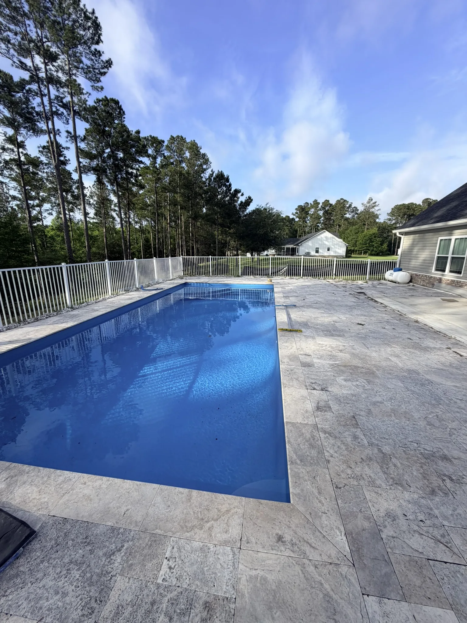 Hammer Residence -- Pool Deck Paver Replacement with Trench Drain photo