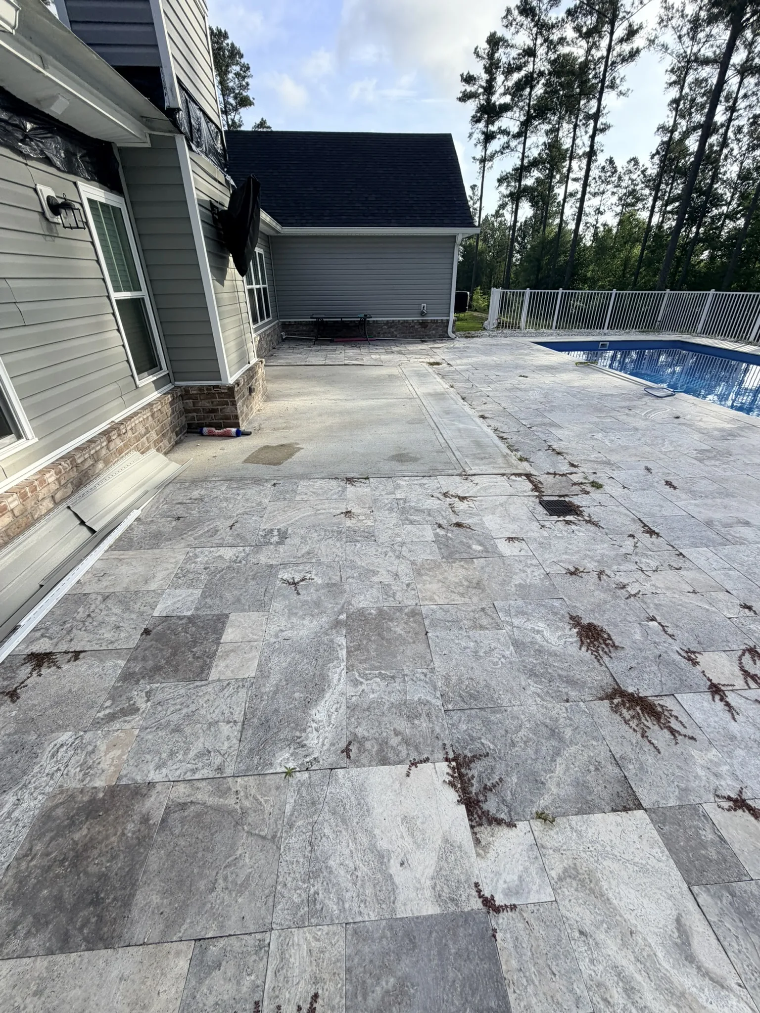 Hammer Residence -- Pool Deck Paver Replacement with Trench Drain photo