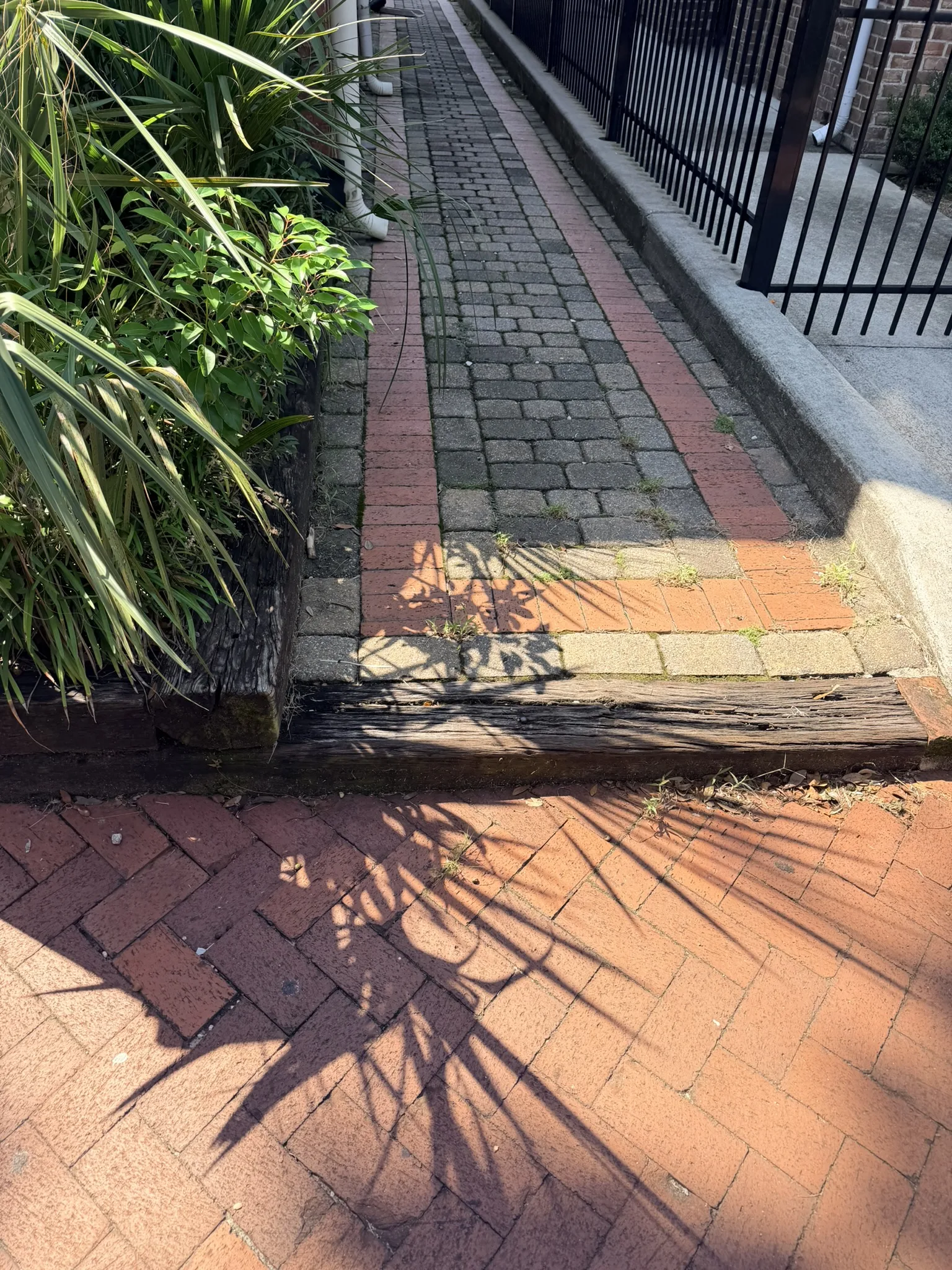 Winston Residence -- Brick Walkway and Stone Planter Wall photo
