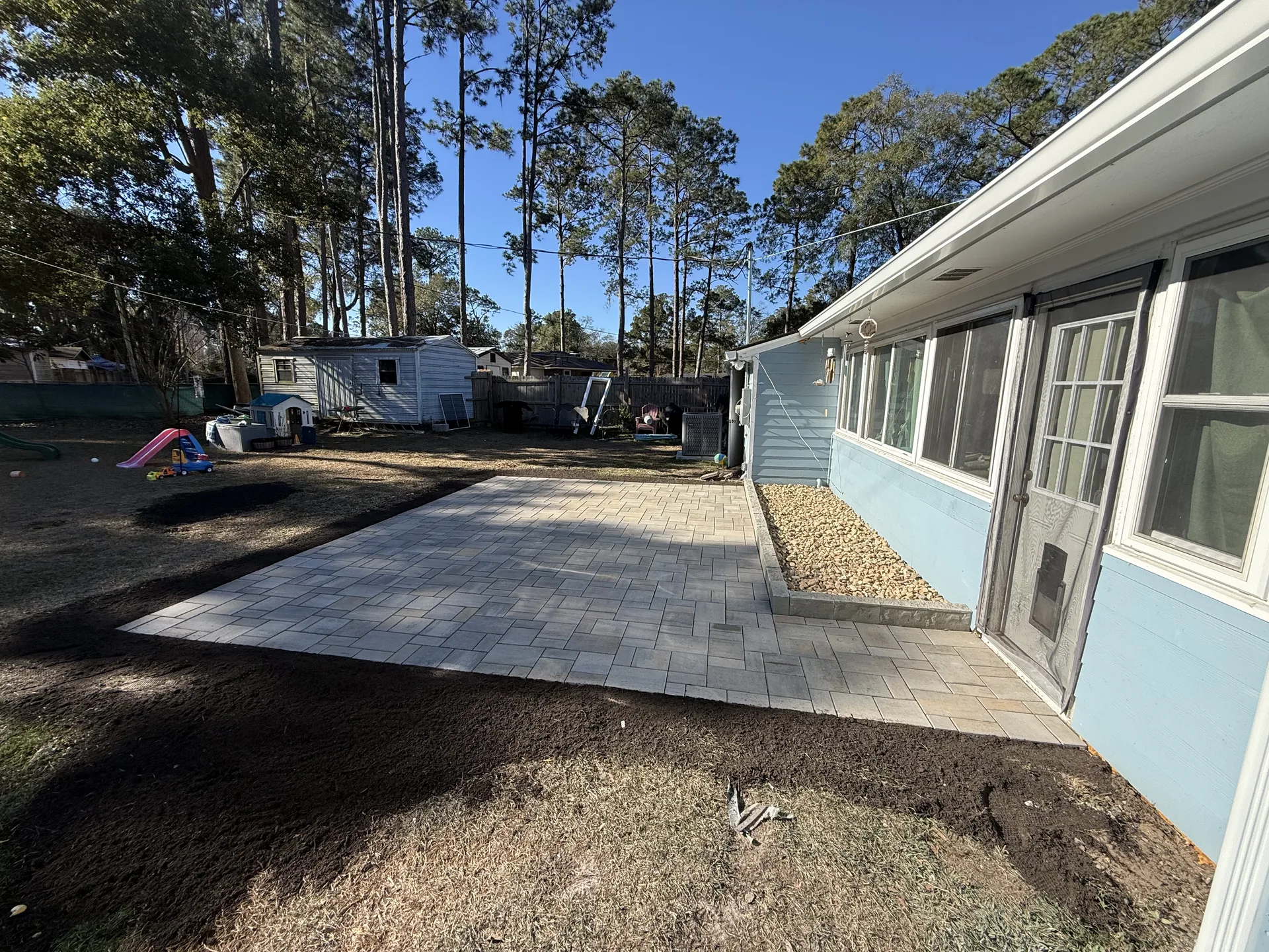 The Gathering Place &mdash; custom fire pit with paver seating area